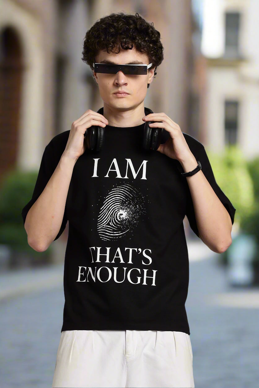 Black T-shirt with ‘I AM. That’s Enough’ affirmation print, minimalist Indian spiritual streetwear with Vedanta-inspired message