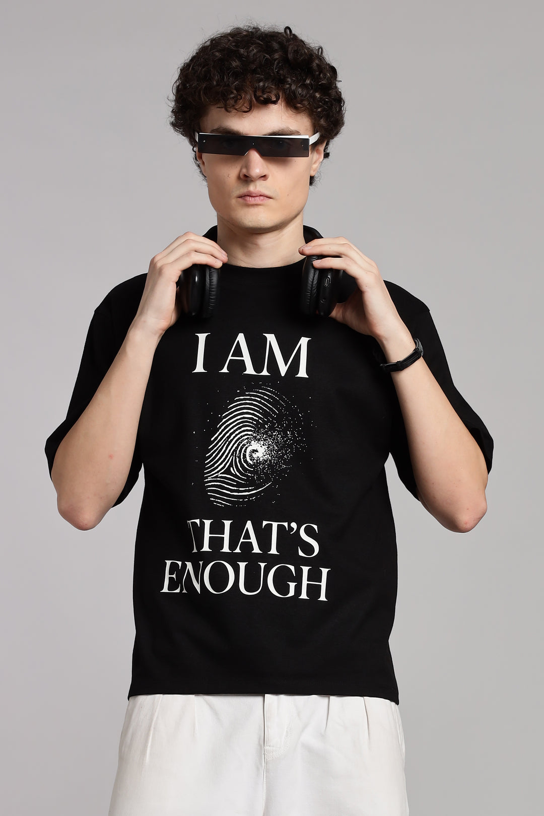 Black T-shirt with ‘I AM. That’s Enough’ affirmation print, minimalist Indian spiritual streetwear with Vedanta-inspired message