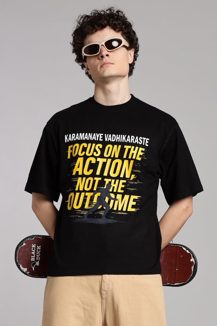 Black T-shirt with ‘Karmanye Vadhikaraste’ Bhagavad Gita quote, Focus on the Action Not the Outcome design, Indian spiritual streetwear in oversized fit